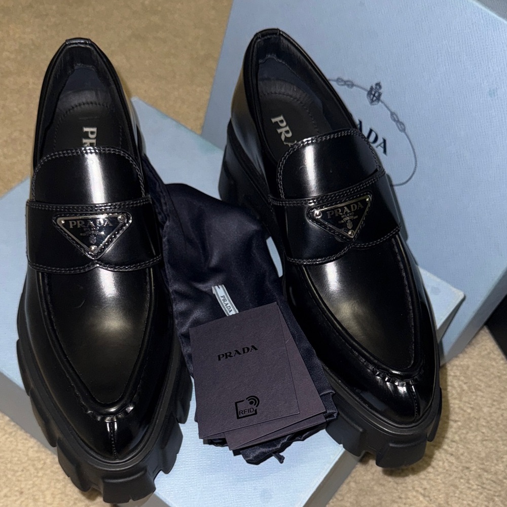 Prada Black Patent Leather Lug-Sole Penny Loafers